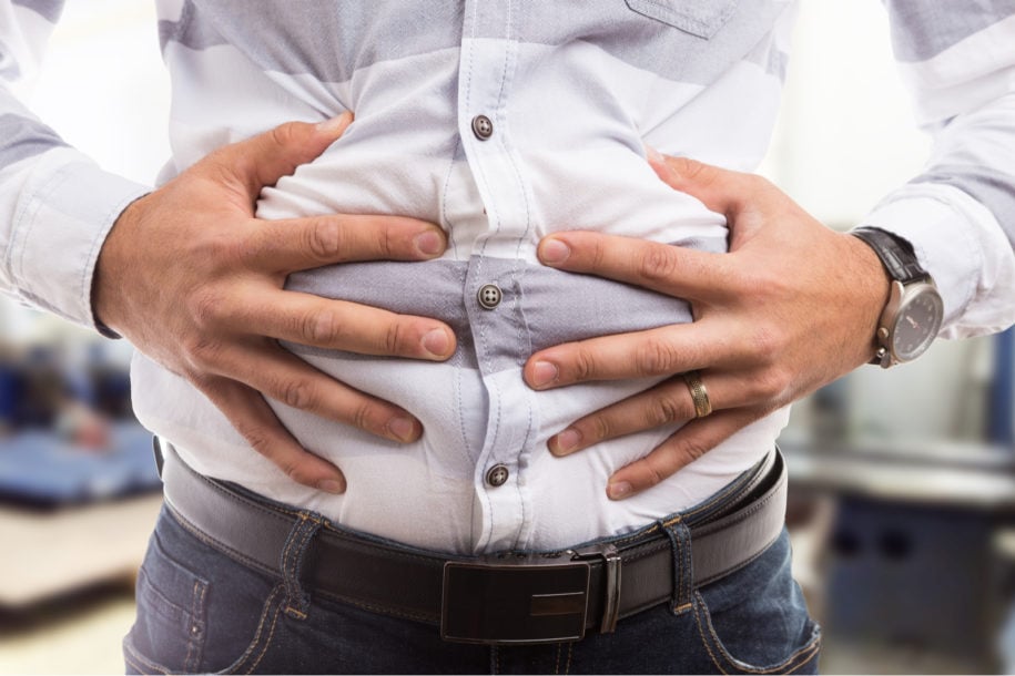 bloated stomach and feeling sick and tired female bloated stomach and feeling sick and tired female